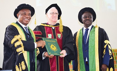 Father Campbell receives honourary doctorate for humanitarian support