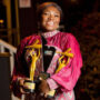 Stacy Amoateng rejoicing after winning three awards on a night