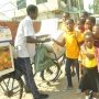 • Adanfo selling to some kids at the Salvation Army School at Laterbiokorshie Photos Lizzy Okai