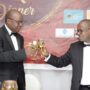 Dr Ernest Addison (left), Governor, BoG, having a toast with his deputy, Dr Maxwell Opoku-Afari