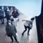 Footage captured the man running forward to push the woman