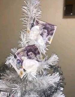 Jail for drug dealer who decorated Christmas tree with cash and cocaine