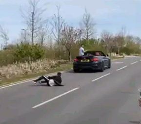 Man falls out of convertible BMW as friend tries to show off