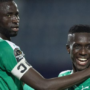 Kouyate (right) and Gueye were both part of the Senegal side that won the country's first African Cup of Nations title in February