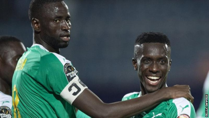 Kouyate (right) and Gueye were both part of the Senegal side that won the country's first African Cup of Nations title in February