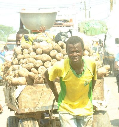 Hustling to provide for the family. Photos: Lizzy Okai