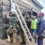 Millitary personnel are helping intall prepaid metres