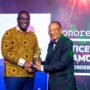 • Justice (RTD) J.C Amoonoo- Monney receiving his honour from NLA Boss, Sammy Awuku