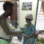 • Mrs. Mayne-Eghan making a donation to a mother of a preterm baby