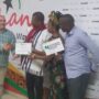 Mr.Naaman receiving his certificate from the Goge Africa team