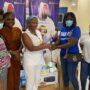 • A staff of Mybitstore presenting the items to nurses at the hospital