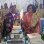 • Most Rev. Boafo (middle) assisted by wife, Helena and Rt. Rev Ansah (second left) cutting the anniversary cake