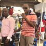 • Mr.Alexander Bankole Williams (in sun glasses) demonstrating how blind persons should be assisted to cross the street or board a vehicle