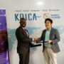 Mr Kwabena Asante Offei (left), with Mr Seungmin Oh (Right) exchanging the agreement after the signing.