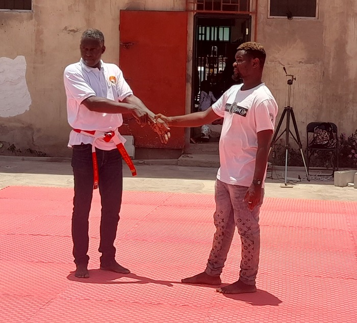 Mr Donald Gwira demonstrates basic self-defence technique