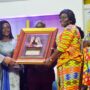 • Rev Prof and Rev Mrs Frimmpong-Manso (right) receiving a plaque from Rev. Dr. and Rev. Mrs Stephen Wengam