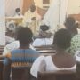 ●●Reverend Father Ignatius Ayivor (standing), delivering his homily
