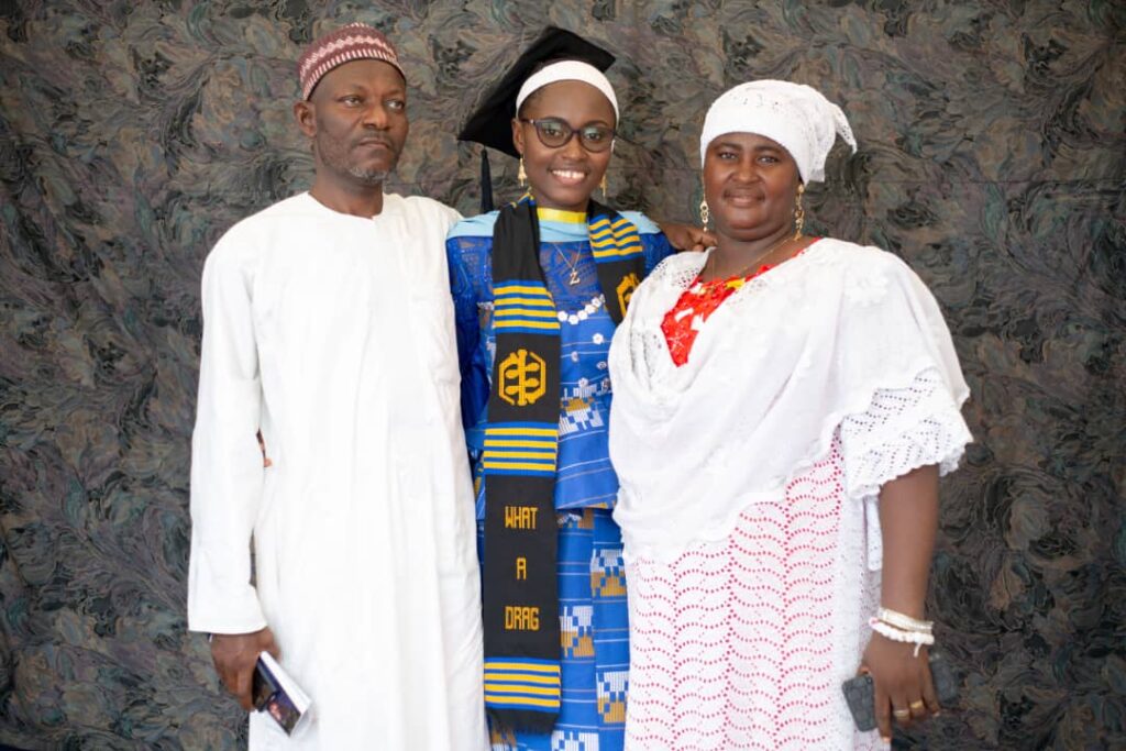 Fauzeeya (middle) flanked by her parents
