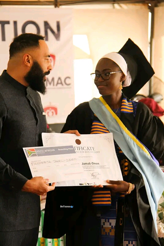 Fauziya receiving certificates