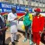 The Minister of Youth and Sports, Mr Ussif Mustapha (in white) speaking with Takyi during the car presentation