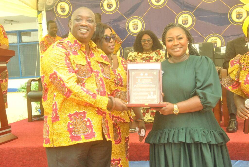 The Vice Chancellor presenting a Citation to Oheneyere Gifty Anti.