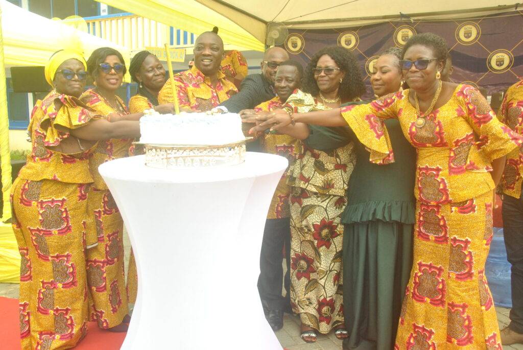 Vice Chancellor, of GCTU Prof. Emmanuel Ohene Afoakwa with Dr. Josephine Larbi-Appau and invited guests cutting the anniversary cake.