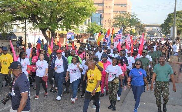 Hundreds walk in campaign against breast cancer