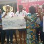 Dr Wiafe Addia (right) receiving the cheque fromMrs Obimpeh (LEFT) cheq