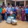 • Staff from BH-FERTAGRO limited donating the items to the paramount Queen mother of MEPE Traditional Area.