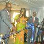 Ms Gifty Twum Ampofo (middle) with Dr. Wilfred Anim-Odame (right) and prof Amevi Acakpovi about to cut the tape