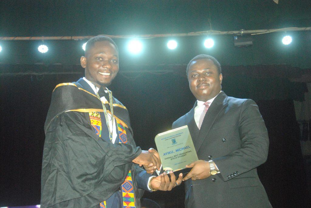 The Overall best student Michael Ayiku receiving his award from Rev. Ntim Fordjour Photos Lizzy Okai.