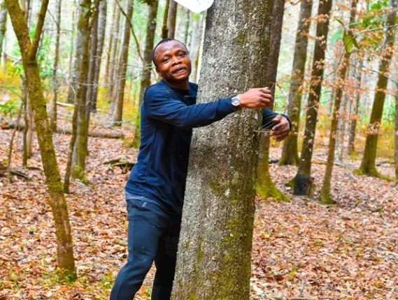 Ghanaian hugs 1,123 trees in an hour for world record